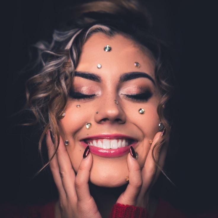 Avery Chen, Lead Design Curator at EmberStoneGrid, reviewing corporate floral arrangements